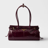 Prada Soft Lux new Bordeaux red motorcycle bag. authentic quality. made of waxed leather. with long handles and a detachable long shoulder strap #83132A
