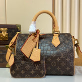 Louis Vuitton Speedy Bandoulière 25 Monogram Leather Handbag Coffee Brown Features Polished Metal Hardware A Lambskin Lining. And An Internal Signature Tag #196001