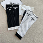 Chanel Women's Black And White knitted Mid-Calf Socks #97456